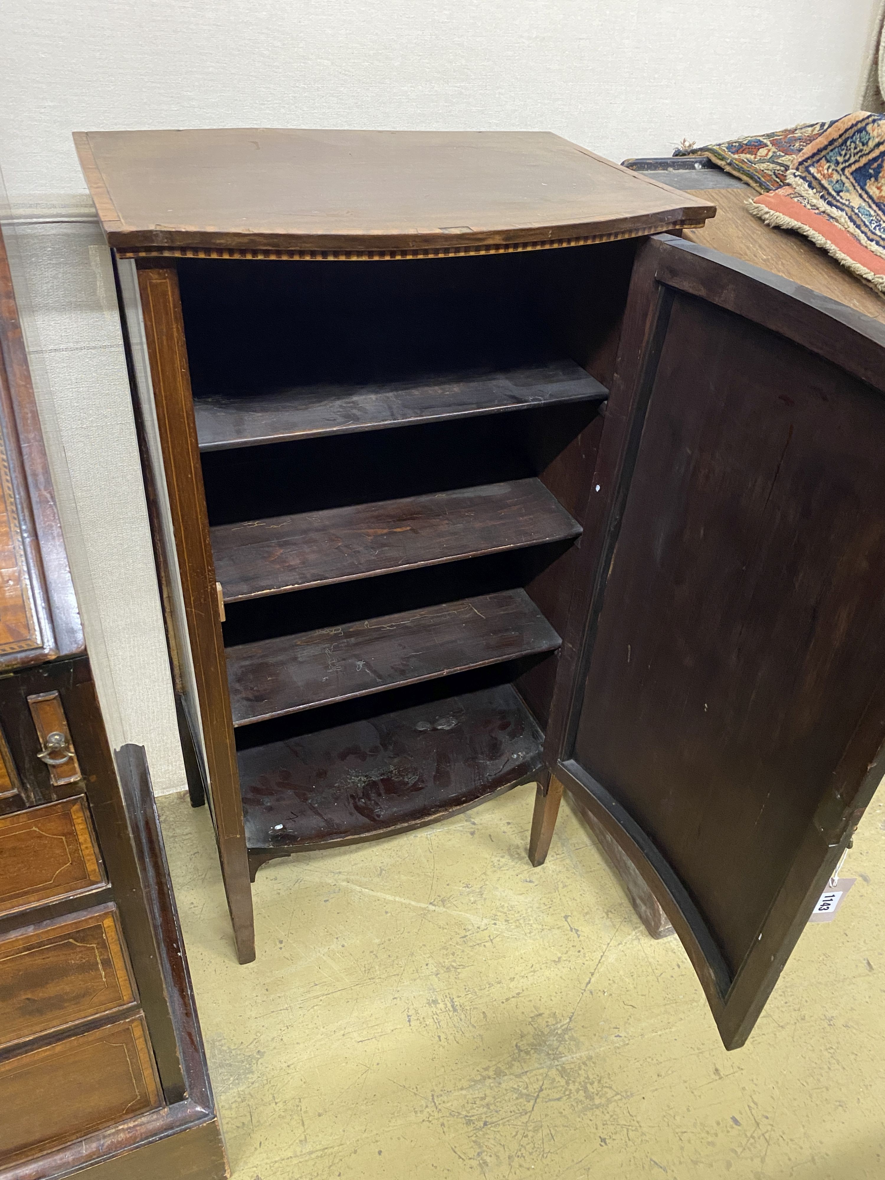 An Edwardian satinwood banded marquetry inlaid mahogany bow front side cabinet, width 53cm, depth 38cm, height 100cm